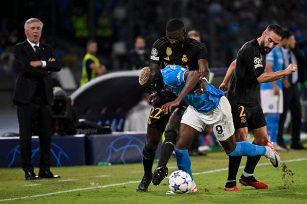 Carlo Ancelotti head coach of Real Madrid CF, Victor Osimhen of SSC Napoli, Antonio Rudiger and Dani Carvajal of Real Madrid CF compete for the ball during the Champions League Group C football match between SSC Napoli and Real Madrid FC at Diego Armando Maradona stadium in Naples (Italy), October 3rd, 2023. AndreaxStaccioli
