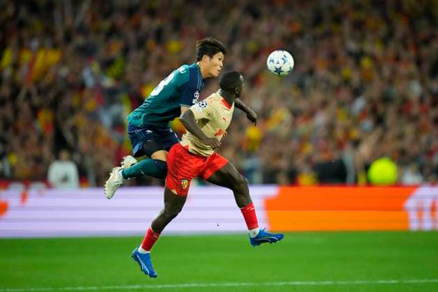 October 3, 2023, Lens, France: DEIVER MACHADO and TAKEHIRO TOMIYASU fights for the ball in the air during the Champions League pool game between Lens and Arsenal at Stade Felix Bollaert on October 3, 2023 in Lens, France. Lens France - ZUMAg253 20231003_zip_g253_042 Copyright: xGlennxGervotx