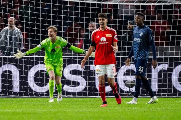 03.10.2023, xfrx, Fussball UEFA Champions League, Union Berlin - Sporting Braga emspor, v.l. Frederik Ronnow (Union Berlin),Diogo Leite (Union Berlin) (DFL DFB REGULATIONS PROHIBIT ANY USE OF PHOTOGRAPHS as IMAGE SEQUENCES and or QUASI-VIDEO) Berlin