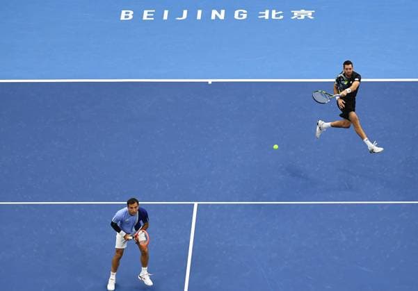 (231004) -- BEIJING, Oct. 4, 2023 -- Ivan Dodig (L) of Croatia and Austin Krajicek of U.S. compete during the men s doubles final between Wesley Koolhof Neal Skupski and Austin Krajicek Ivan Dodig at 2023 China Open tennis tournament in Beijing, capital of China, Oct. 4, 2023. ) (SP)CHINA-BEIJING-TENNIS-CHINA OPEN-MEN S DOUBLES-FINAL (CN) ZhangxChenlin 