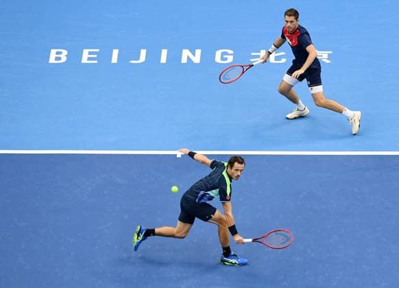 (231004) -- BEIJING, Oct. 4, 2023 -- Wesley Koolhof (L) of Netherlands and Neal Skupski of Britain compete during the men s doubles final between Wesley Koolhof Neal Skupski and Austin Krajicek Ivan Dodig at 2023 China Open tennis tournament in Beijing, capital of China, Oct. 4, 2023. ) (SP)CHINA-BEIJING-TENNIS-CHINA OPEN-MEN S DOUBLES-FINAL (CN) ZhangxChenlin 