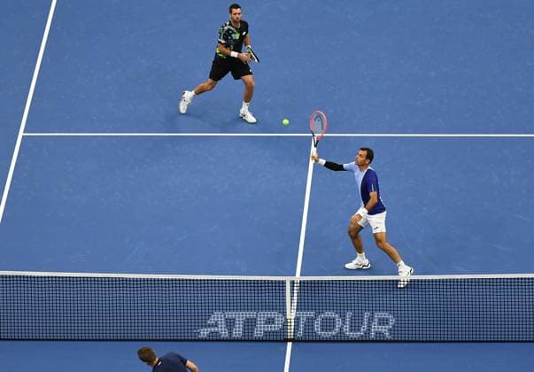 (231004) -- BEIJING, Oct. 4, 2023 -- Ivan Dodig (R) of Croatia and Austin Krajicek of U.S. compete during the men s doubles final between Wesley Koolhof Neal Skupski and Austin Krajicek Ivan Dodig at 2023 China Open tennis tournament in Beijing, capital of China, Oct. 4, 2023. ) (SP)CHINA-BEIJING-TENNIS-CHINA OPEN-MEN S DOUBLES-FINAL (CN) ZhangxChenlin 