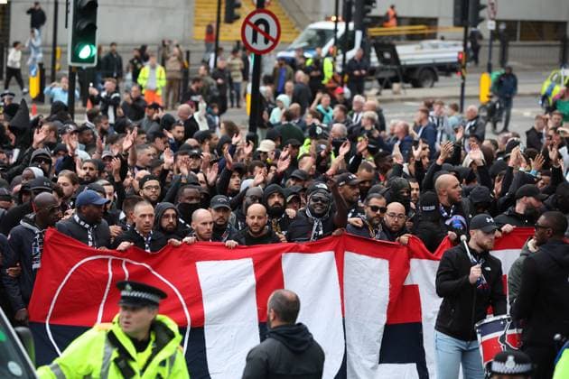 Newcastle Upon Tyne, England, 4th October 2023. Paris Saint Germain fans arrive ahead of the UEFA Champions League match at St. James Park, Newcastle Upon Tyne. Picture credit should read: Nigel Roddis Sportimage EDITORIAL USE ONLY. No use with unauthorised audio, video, data, fixture lists, club league logos or live services. Online in-match use limited to 120 images, no video emulation. No use in betting, games or single club league player publications. SPI-2627-0007