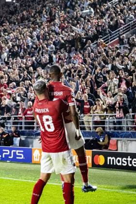 Antwerp s Michel Ange Balikwisha celebrates after scoring during a soccer game between Belgian soccer team Royal Antwerp FC and Ukrainian club Shakhtar Donetsk, on Wednesday 04 October 2023 in Antwerp, on day two of the Champions League group stage, in the group H. BRUNOxFAHY  x76284984x