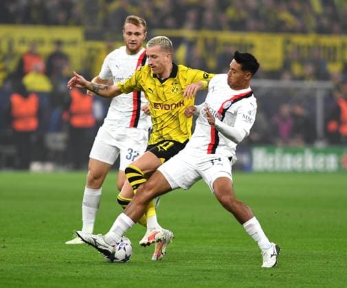 04.10.2023, Dortmund, Germany, Signal-Iduna-Park, Borussia Dortmund vs AC Milan - UEFA Champions League 2023 2024 - Group F, Marco Reus (Borussia Dortmund) und Tijjani Reijnders (AC Mailand) im Zweikampf (Foto Ralf Treese) Dortmund Signal-Iduna-Park North Rhine-Westphalia Germany