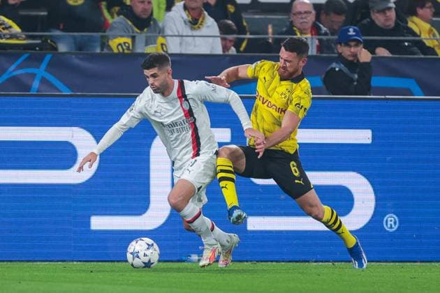 04.10.2023, Fussball, Saison 2023 2024, UEFA Champions League, Gruppenphase, Borussia Dortmund - AC Milan, v. l. Christian Pulisic (AC Milan), Salih Özcan (Borussia Dortmund), Dortmund Signal Iduna Park NRW Deutschland xRHR-FOTO DEx Copyright: DennisxEwert RHR-FOTOx RHR-FOTO DE