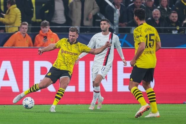 04.10.2023, Fussball, Saison 2023 2024, UEFA Champions League, Gruppenphase, Borussia Dortmund - AC Milan, v. l. +ao14+, Christian Pulisic (AC Milan), Dortmund Signal Iduna Park NRW Deutschland xRHR-FOTO DEx Copyright: DennisxEwert RHR-FOTOx RHR-FOTO DE