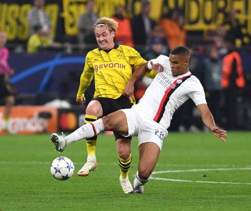 04.10.2023, Dortmund, Germany, Signal-Iduna-Park, Borussia Dortmund vs AC Milan - UEFA Champions League 2023 2024 - Group F, Julian Brandt (Borussia Dortmund) und Malick Thiaw (AC Mailand) im Zweikampf (Foto Ralf Treese) Dortmund Signal-Iduna-Park North Rhine-Westphalia Germany