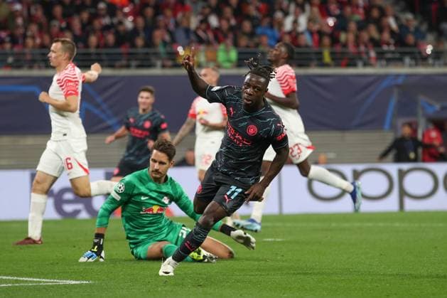 04.10.2023, xtgx, Fussball UEFA Champions League, RB Leipzig - Manchester City emspor, v.l. Jeremy Doku (Manchester City, 11) Jubel, Torjubel, jubelt ueber das Tor, celebrate the goal, celebration (DFL DFB REGULATIONS PROHIBIT ANY USE OF PHOTOGRAPHS as IMAGE SEQUENCES and or QUASI-VIDEO) Leipzig