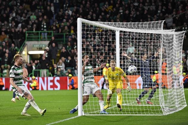 Celtic v Lazio UEFA Champions League Cameron Carter-Vickers and Joe Hart of Celtic watch Pedro of Lazio?s goal during the UEFA Champions League Group E match at Celtic Park, Glasgow Copyright: xJamiexJohnstonx FIL-19061-0052 UK Newspapers OUT