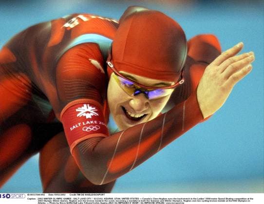 2002 WINTER Olympic Games, Olympische Spiele, Olympia, OS : 2002 WINTER OLYMPIC GAMES : SALT LAKE CITY 02 23 02, KEARNS, UTAH, UNITED STATES --- Canada s Clara Hughes eyes the backstretch in the Ladies 5000-meter Speed skating, Eisschnelllauf competition at the 2002 Olympic Winter games, Winterspiele,Spiele, Summer games Hughes won the bronze medal in the event, becoming a medalist in both the Summer and Winter Olympics. Hughes won two cycling bronze medals at the1996 Olympics in Atlanta. --- Photo by Steve Griffin Salt Lake Tribune Corbis Sygma JEUX OLYMPIQUES D HIVER OLYMPISCHE SPELEN www.iso be Ogden United States ETATS UNIS VERENIGDE STATEN  Copyright: xTIMxDExWAELEx 56599