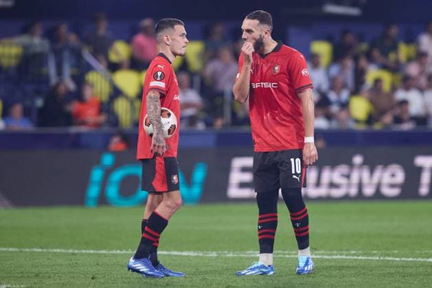 Amine Gouiri of Rennes FC (R) talks with Benjamin Enzo Le Fee of Rennes FC (L) uring the UEFA Europa League match between Villarreal and Rennes at Estadio de la Ceramica on October 5, 2023 in Villarreal, Spain. FOOTBALL : Villarreal vs Stade Rennes Football Club - UEFA Europa Leage - 05 10 2023 AlvaroMedranda Panoramic 