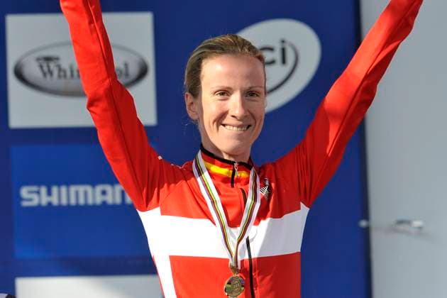 20080924 - VARESE, ITALY: Dutch cyclist Judith Arndt celebrates on the podium after the women time trial cycling competition, at the World Championships, in Varese, Italy, Wednesday 24 September 2008. PHOTO LUC CLAESSEN VARESE ITALY  Copyright: xLUCxCLAESSENx 185517