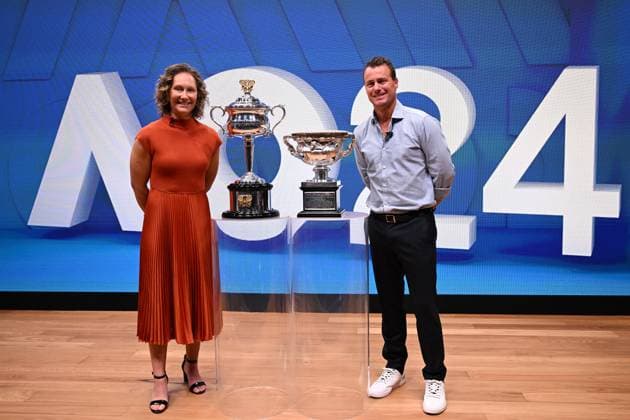 TENNIS AUS OPEN LAUNCH, Former Australian tennis players Samantha Stosur (left) and Lleyton Hewitt pose for a photograph with the Daphne Akhurst Memorial Cup and the Norman Brookes Challenge Cup during the launch of the 2024 Australian Open tennis tournament at Melbourne Park in Melbourne, Wednesday, October 11, 2023. ( NO ARCHIVING, EDITORIAL USE ONLY, NO USE IN BOOKS WITHOUT CONSENT MELBOURNE VICTORIA AUSTRALIA  Copyright: xJAMESxROSSx 20231011001850989484