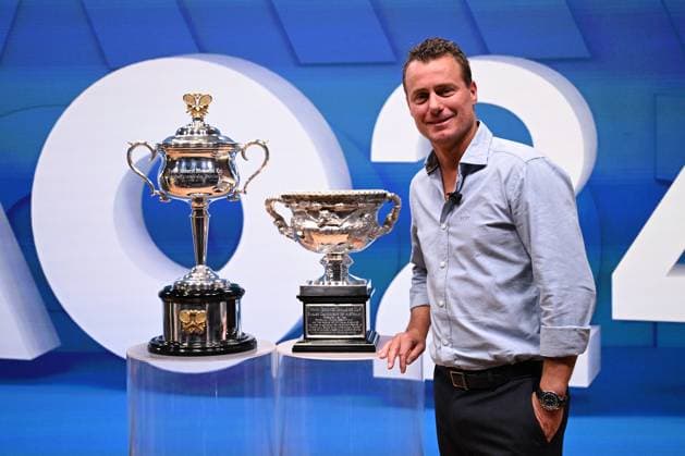 TENNIS AUS OPEN LAUNCH, Former Australian tennis player Lleyton Hewitt poses for a photograph with the Daphne Akhurst Memorial Cup and the Norman Brookes Challenge Cup during the launch of the 2024 Australian Open tennis tournament at Melbourne Park in Melbourne, Wednesday, October 11, 2023. ( NO ARCHIVING, EDITORIAL USE ONLY, NO USE IN BOOKS WITHOUT CONSENT MELBOURNE VICTORIA AUSTRALIA  Copyright: xJAMESxROSSx 20231011001850989551