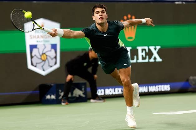 (231011) -- SHANGHAI, Oct. 11, 2023 -- Carlos Alcaraz of Spain returns the ball during the men s singles round of 16 match between Carlos Alcaraz of Spain and Grigor Dimitrov of Bulgaria at the ATP, Tennis Herren Shanghai Masters tennis tournament in Shanghai, east China, Oct. 11, 2023. ) (SP)CHINA-SHANGHAI-TENNIS-ATP TOUR-SHANGHAI MASTERS(CN) WangxLili 