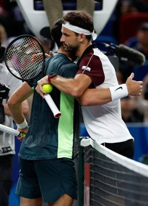 (231011) -- SHANGHAI, Oct. 11, 2023 -- Grigor Dimitrov (R) greets Carlos Alcaraz after winning the men s singles round of 16 match between Carlos Alcaraz of Spain and Grigor Dimitrov of Bulgaria at the ATP, Tennis Herren Shanghai Masters tennis tournament in Shanghai, east China, Oct. 11, 2023. ) (SP)CHINA-SHANGHAI-TENNIS-ATP TOUR-SHANGHAI MASTERS(CN) WangxLili 