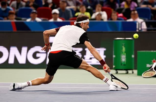 (231011) -- SHANGHAI, Oct. 11, 2023 -- Grigor Dimitrov of Bulgaria returns the ball during the men s singles round of 16 match between Carlos Alcaraz of Spain and Grigor Dimitrov of Bulgaria at the ATP, Tennis Herren Shanghai Masters tennis tournament in Shanghai, east China, Oct. 11, 2023. ) (SP)CHINA-SHANGHAI-TENNIS-ATP TOUR-SHANGHAI MASTERS(CN) WangxLili 