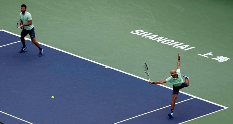 Sport Bilder des Tages (231012) -- SHANGHAI, Oct. 12, 2023 -- Sadio Doumbia(R) Fabien Reboul of France compete during the men s doubles quaterfinal between Sadio Doumbia Fabien Reboul of France and Wesley Koolhof of the Netherlands Neal Skupski of Britain at the ATP, Tennis Herren World Tour Shanghai Masters tennis tournament at Qizhong Forest Sports City Arena in Shanghai, east China, Oct. 12, 2023. ) (SP)CHINA-SHANGHAI-TENNIS-ATP TOUR-SHANGHAI MASTERS(CN) WangxLili 