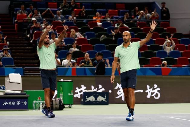 (231012) -- SHANGHAI, Oct. 12, 2023 -- Sadio Doumbia(R) Fabien Reboul of France wave to the spectators after the men s doubles quaterfinal between Sadio Doumbia Fabien Reboul of France and Wesley Koolhof of the Netherlands Neal Skupski of Britain at the ATP, Tennis Herren World Tour Shanghai Masters tennis tournament at Qizhong Forest Sports City Arena in Shanghai, east China, Oct. 12, 2023. ) (SP)CHINA-SHANGHAI-TENNIS-ATP TOUR-SHANGHAI MASTERS(CN) WangxLili 