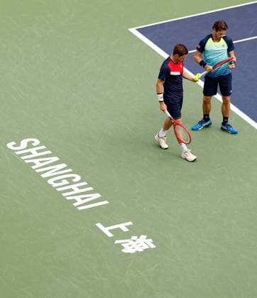 (231012) -- SHANGHAI, Oct. 12, 2023 -- Wesley Koolhof of the Netherlands Neal Skupski (L) of Britain react during the men s doubles quaterfinal between Sadio Doumbia Fabien Reboul of France and Wesley Koolhof of the Netherlands Neal Skupski of Britain at the ATP, Tennis Herren World Tour Shanghai Masters tennis tournament at Qizhong Forest Sports City Arena in Shanghai, east China, Oct. 12, 2023. ) (SP)CHINA-SHANGHAI-TENNIS-ATP TOUR-SHANGHAI MASTERS(CN) WangxLili 