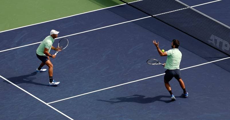 (231012) -- SHANGHAI, Oct. 12, 2023 -- Sadio Doumbia Fabien Reboul(R) of France compete during the men s doubles quaterfinal between Sadio Doumbia Fabien Reboul of France and Wesley Koolhof of the Netherlands Neal Skupski of Britain at the ATP, Tennis Herren World Tour Shanghai Masters tennis tournament at Qizhong Forest Sports City Arena in Shanghai, east China, Oct. 12, 2023. ) (SP)CHINA-SHANGHAI-TENNIS-ATP TOUR-SHANGHAI MASTERS(CN) WangxLili 