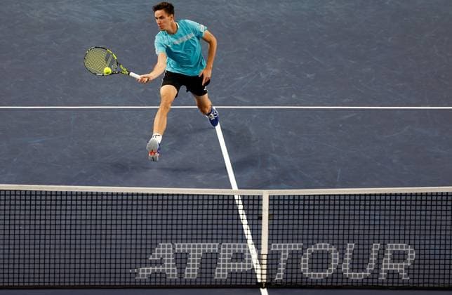 (231012) -- SHANGHAI, Oct. 12, 2023 -- Fabian Marozsan returns the ball during the men s singles quaterfinal between Fabian Marozsan of Hungary and Hubert Hurkacz of Poland at the ATP, Tennis Herren World Tour Shanghai Masters tennis tournament at Qizhong Forest Sports City Arena in Shanghai, east China, Oct. 12, 2023. ) (SP)CHINA-SHANGHAI-TENNIS-ATP TOUR-SHANGHAI MASTERS(CN) WangxLili 