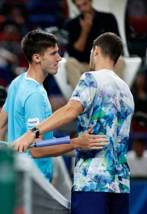 (231012) -- SHANGHAI, Oct. 12, 2023 -- Hubert Hurkacz (R) greets Fabian Marozsan after winning the men s singles quaterfinal between Fabian Marozsan of Hungary and Hubert Hurkacz of Poland at the ATP, Tennis Herren World Tour Shanghai Masters tennis tournament at Qizhong Forest Sports City Arena in Shanghai, east China, Oct. 12, 2023. ) (SP)CHINA-SHANGHAI-TENNIS-ATP TOUR-SHANGHAI MASTERS(CN) WangxLili 