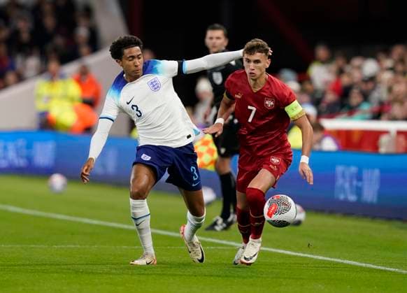 Nottingham, England, 12th October 2023. Bashir Humphreys of England and Stefan Mitrovic of Serbia during the UEFA European Under-21 Championship Qualifier match at the City Ground, Nottingham. Picture credit should read: Andrew Yates Sportimage EDITORIAL USE ONLY. No use with unauthorised audio, video, data, fixture lists, club league logos or live services. Online in-match use limited to 120 images, no video emulation. No use in betting, games or single club league player publications. SPI-2644-0003
