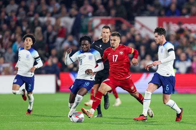England s Jon Rowe & Serbia s Milos Pantovic battle for possession during the UEFA U-21 EURO 2025 Qualifier match between England U-21 and Serbia U-21 at the City Ground, Nottingham, England on 12 October 2023. Copyright: xStuartxLeggettx 38630038