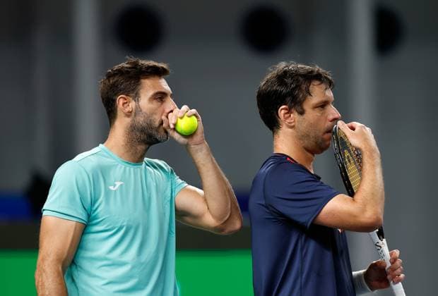 (231013) -- SHANGHAI, Oct. 13, 2023 -- Marcel Granollers (L) of Spain Horacio Zeballos of Argentina react during the men s doubles semifinal between Marcel Granollers of Spain Horacio Zeballos of Argentina and Rinky Hijikata of Australia Cameron Norrie of Britain at the ATP, Tennis Herren World Tour Shanghai Masters tennis tournament at Qizhong Forest Sports City Arena in Shanghai, east China, Oct. 13, 2023. ) (SP)CHINA-SHANGHAI-TENNIS-ATP TOUR-SHANGHAI MASTERS(CN) WangxLili 