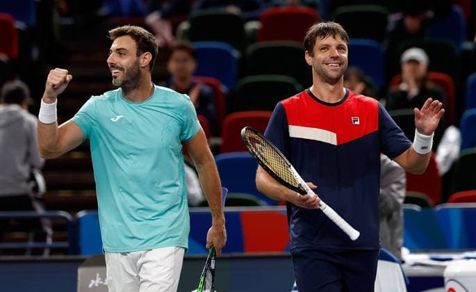 (231013) -- SHANGHAI, Oct. 13, 2023 -- Marcel Granollers (L) of Spain Horacio Zeballos of Argentina greet spectators after the men s doubles semifinal between Marcel Granollers of Spain Horacio Zeballos of Argentina and Rinky Hijikata of Australia Cameron Norrie of Britain at the ATP, Tennis Herren World Tour Shanghai Masters tennis tournament at Qizhong Forest Sports City Arena in Shanghai, east China, Oct. 13, 2023. ) (SP)CHINA-SHANGHAI-TENNIS-ATP TOUR-SHANGHAI MASTERS(CN) WangxLili 