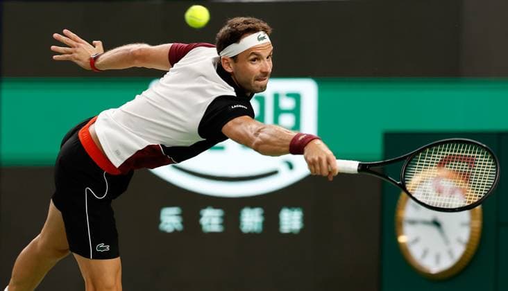 (231013) -- SHANGHAI, Oct. 13, 2023 -- Grigor Dimitrov of Bulgaria returns the ball during the men s singles quaterfinal against Nicolas Jarry of Chile at the ATP, Tennis Herren World Tour Shanghai Masters tennis tournament at Qizhong Forest Sports City Arena in Shanghai, east China, Oct. 13, 2023. ) (SP)CHINA-SHANGHAI-TENNIS-ATP TOUR-SHANGHAI MASTERS(CN) WangxLili 