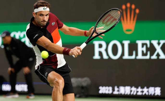 (231013) -- SHANGHAI, Oct. 13, 2023 -- Grigor Dimitrov of Bulgaria returns the ball during the men s singles quaterfinal against Nicolas Jarry of Chile at the ATP, Tennis Herren World Tour Shanghai Masters tennis tournament at Qizhong Forest Sports City Arena in Shanghai, east China, Oct. 13, 2023. ) (SP)CHINA-SHANGHAI-TENNIS-ATP TOUR-SHANGHAI MASTERS(CN) WangxLili 