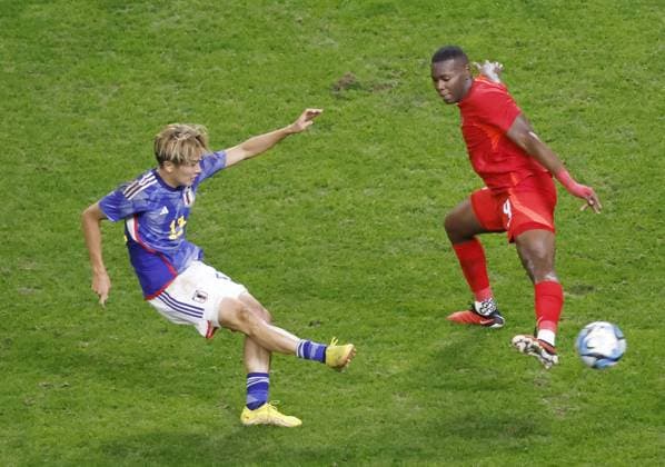 Football: friendly between Japan and Canada Japan s Keito Nakamura (L) scores a goal during the first half of an international football friendly against Canada at Denka Big Swan Stadium in Niigata on Oct. 13, 2023.  A14AA0002013681P