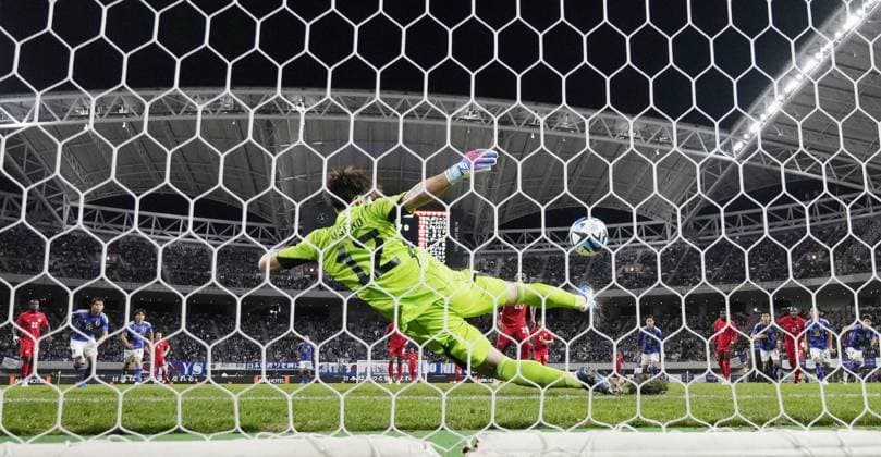 Football: friendly between Japan and Canada Japan goalkeeper Keisuke Osako saves a penalty during the first half of a football friendly against Canada at Denka Big Swan Stadium in Niigata on Oct. 13, 2023.  A14AA0002013759P