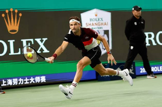 (231013) -- SHANGHAI, Oct. 13, 2023 -- Grigor Dimitrov returns the ball during the men s singles quaterfinal between Grigor Dimitrov of Bulgaria and Nicolas Jarry of Chile at the ATP, Tennis Herren World Tour Shanghai Masters tennis tournament at Qizhong Forest Sports City Arena in Shanghai, east China, Oct. 13, 2023. ) (SP)CHINA-SHANGHAI-TENNIS-ATP TOUR-SHANGHAI MASTERS(CN) WangxLili 
