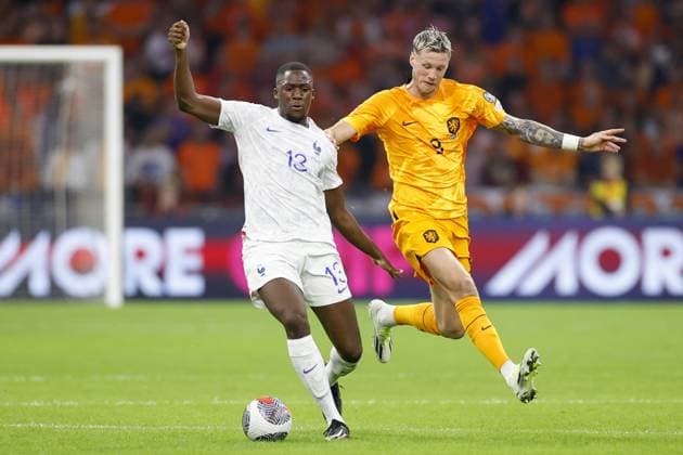 AMSTERDAM, 13-10-2023 JohanCruyff Arena, Football Euro2024 Qualifier between Netherlands and France. France player Randal Kolo Muani and Netherlands player Wout Weghorst Netherlands - France  x22733515x Copyright: