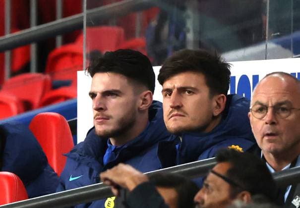 Harry Maguire and Declan Rice on the subs bench at the England v Australia friendly match at Wembley Stadium, London, UK on 13th October, 2023. 