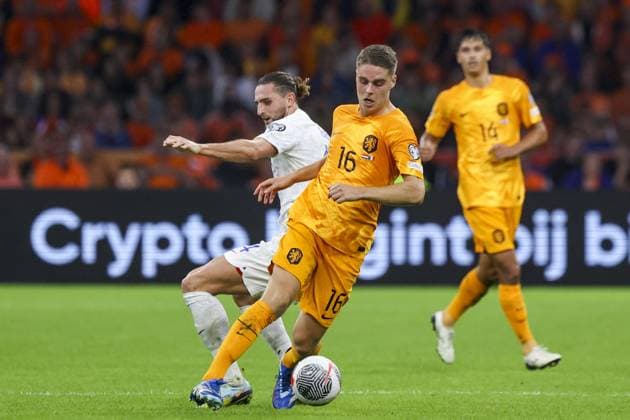 AMSTERDAM, 13-10-2023 JohanCruyff Arena, Football Euro2024 Qualifier between Netherlands and France. Netherlands player Joey Veerman and France player Adrien Rabiot Netherlands - France  x22734693x Copyright: