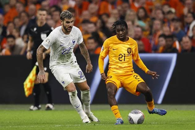 AMSTERDAM - (l-r) Theo Hernandez of France, Jeremie Frimping of Holland during the European Championship, EM, Europameisterschaft Qualifying match in group B between the Netherlands and France at the Johan Cruijff ArenA on October 13, 2023 in Amsterdam, Netherlands. ANP MAURICE VAN STEEN UEFA EURO, EM, Europameisterschaft,Fussball 2024 Qualifying Round 2023 2024 xVIxANPxSportx xxANPxIVx 481002746 originalFilename: 481002746.jpg