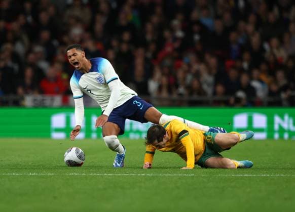Craig Goodwin (A) Levi Colwill (E) at the England v Australia friendly match at Wembley Stadium, London, UK on 13th October, 2023. 