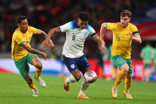 13th October 2023; Wembley Stadium, London, England; International Football Friendly, England versus Australia; Ollie Watkins of England takes on Keanu Baccus and Ryan Strain of Australia  ActionPlus12564279 ShaunxBrooks