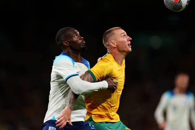 13th October 2023; Wembley Stadium, London, England; International Football Friendly, England versus Australia; Fikayo Tomori of England competes for the ball with Mitchell Duke of Australia  ActionPlus12564283 ShaunxBrooks