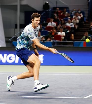 (231014) -- SHANGHAI, Oct. 14, 2023 -- Hubert Hurkacz returns the ball during the men s singles semifinal between Hubert Hurkacz of Poland and Sebastian Korda of the United States at the ATP, Tennis Herren World Tour Shanghai Masters tennis tournament at Qizhong Forest Sports City Arena in Shanghai, east China, Oct. 14, 2023. ) (SP)CHINA-SHANGHAI-TENNIS-ATP TOUR-SHANGHAI MASTERS(CN) WangxLili 