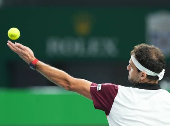 (231015) -- SHANGHAI, Oct. 15, 2023 -- Grigor Dimitrov of Bulgaria serves during the men s singles semifinal between Grigor Dimitrov of Bulgaria and Andrey Rublev of Russia at the ATP, Tennis Herren World Tour Shanghai Masters tennis tournament at Qizhong Forest Sports City Arena in Shanghai, east China, Oct. 14, 2023. ) (SP)CHINA-SHANGHAI-TENNIS-ATP TOUR-SHANGHAI MASTERS(CN) DingxTing 