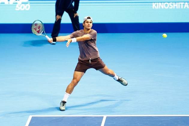 October 15, 2023, Tokyo, Japan: Marcos GIRON (USA) hits a return against Yasutaka UCHIYAMA (JPN) during the qualifying final match for the Kinoshita Group Japan Open Tennis Championships 2023 at the Ariake Coliseum. This is the longest-running ATP, Tennis Herren Tour tournament in Asia, first held in 1972. The tournament runs from October 16 to 22. Giron won 6-3, 6-2. Tokyo Japan - ZUMAm191 20231015_aap_m191_040 Copyright: xRodrigoxReyesxMarinx