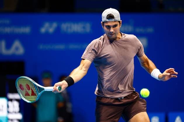October 15, 2023, Tokyo, Japan: Marcos GIRON (USA) hits a return against Yasutaka UCHIYAMA (JPN) during the qualifying final match for the Kinoshita Group Japan Open Tennis Championships 2023 at the Ariake Coliseum. This is the longest-running ATP, Tennis Herren Tour tournament in Asia, first held in 1972. The tournament runs from October 16 to 22. Giron won 6-3, 6-2. Tokyo Japan - ZUMAm191 20231015_aap_m191_058 Copyright: xRodrigoxReyesxMarinx