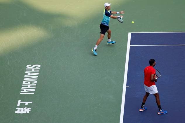 (231015) -- SHANGHAI, Oct. 15, 2023 -- Rohan Bopanna of India Matthew Ebden (L) of Australia compete during the men s doubles final between Marcel Granollers of Spain Horacio Zeballos of Argentina and Rohan Bopanna of India Matthew Ebden of Australia at the ATP, Tennis Herren World Tour Shanghai Masters tennis tournament at Qizhong Forest Sports City Arena in Shanghai, east China, Oct. 15, 2023. ) (SP)CHINA-SHANGHAI-TENNIS-ATP TOUR-SHANGHAI MASTERS(CN) WangxLili 
