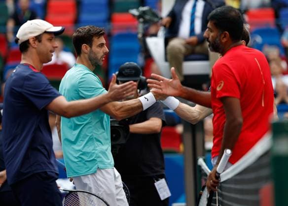 (231015) -- SHANGHAI, Oct. 15, 2023 -- Marcel Granollers (2nd L) of Spain Horacio Zeballos (1st L) of Argentina shake hands with Rohan Bopanna (1st R) of India Matthew Ebden of Australia after their men s doubles final at the ATP, Tennis Herren World Tour Shanghai Masters tennis tournament at Qizhong Forest Sports City Arena in Shanghai, east China, Oct. 15, 2023. ) (SP)CHINA-SHANGHAI-TENNIS-ATP TOUR-SHANGHAI MASTERS(CN) WangxLili 